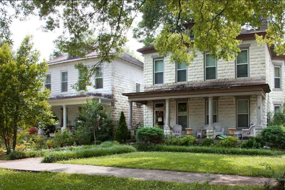 Two white two-story Sears Roebuck catalog homes in Tuscumbia, Alabama